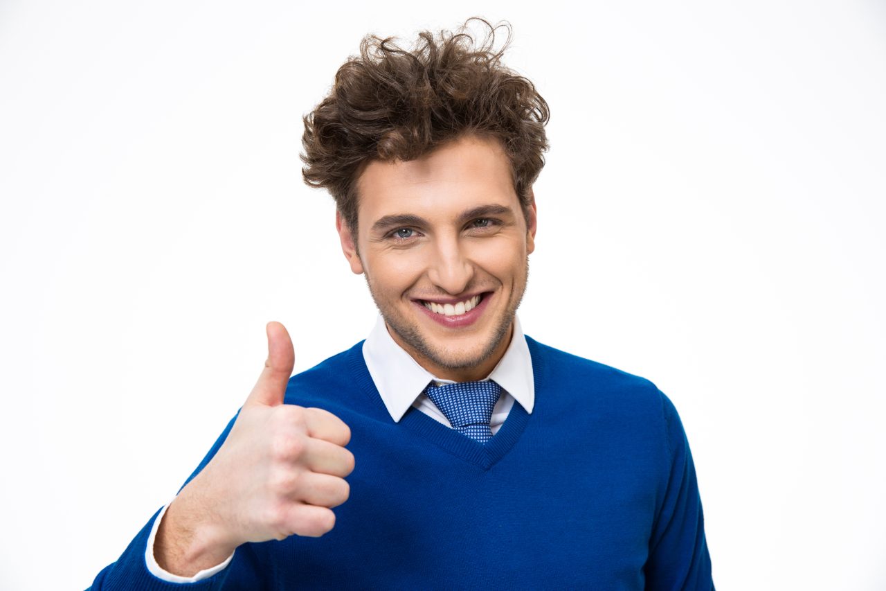 Happy man with thumb up over white background